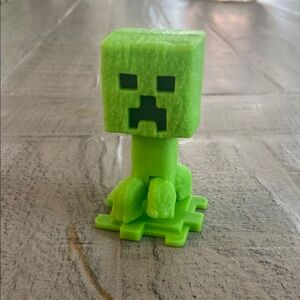 Green Creeper Figurine